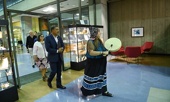 Catherine Martin, Dal's Director of Indigenous Community Engagement, followed by Dalhousie President Deep Saini, and others into Ko’jua Okuom in Dal's Killam Library. (Danny Abriel photos)