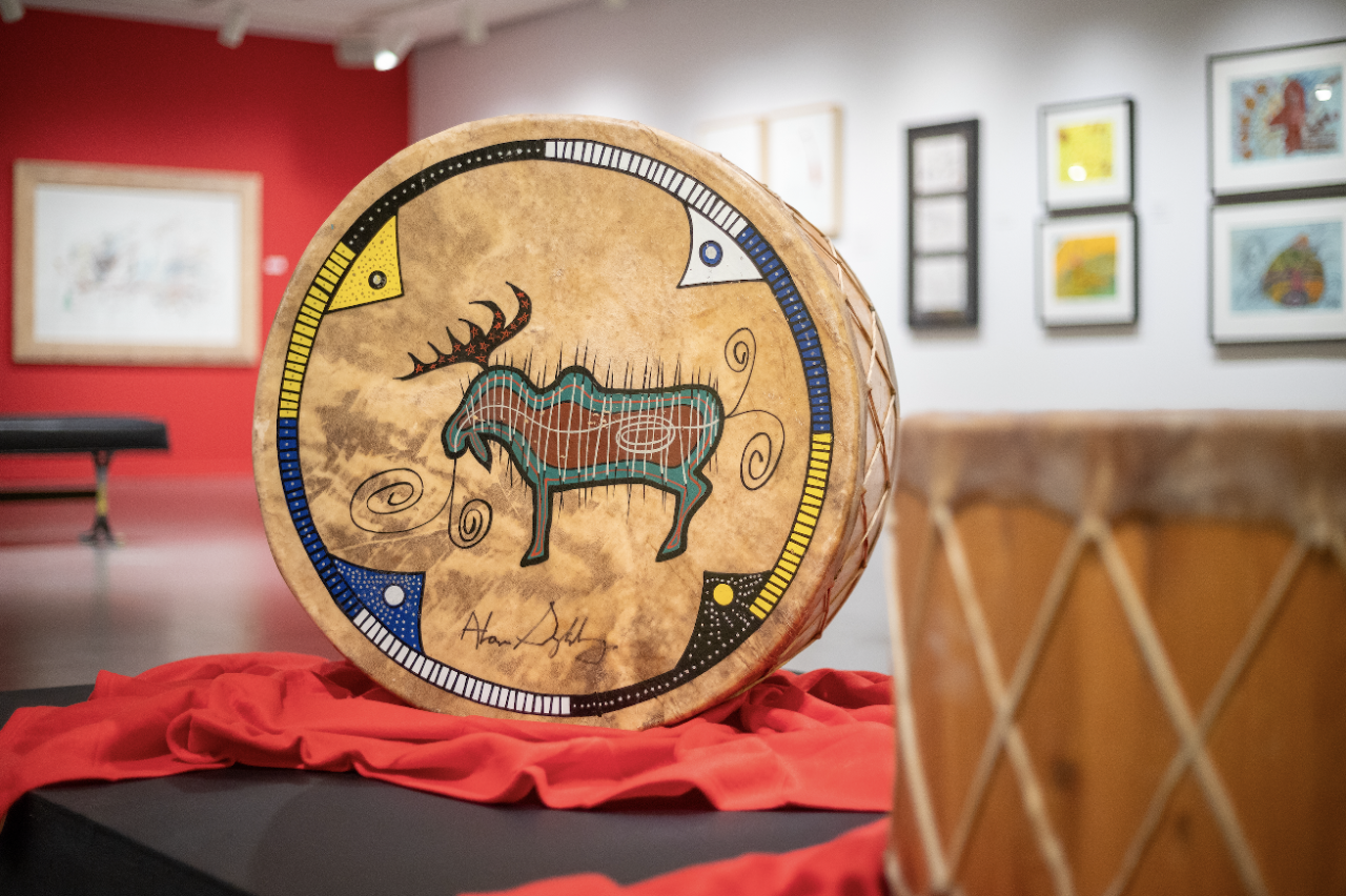 painted drum from Alan Syliboy on display at the art gallery