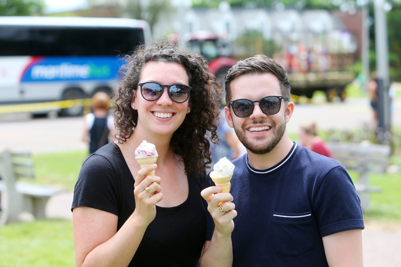 Two guests smile holding ice cream cones at Community Day held at Dal's Agricultural Campus.